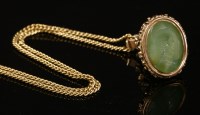 Lot 14 - A gold hardstone seal