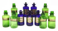 Lot 197 - Eleven coloured glass drug jars and stoppers