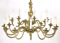 Lot 100 - A pair of Dutch-style six-branch brass electroliers
