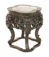 Lot 1324 - A Chinese wood vase stand