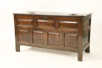 Lot 559 - An oak coffer