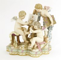 Lot 150 - A Meissen group of three cherubs at an easel