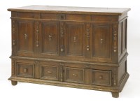 Lot 573 - An oak dower chest