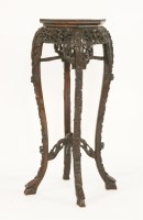 Lot 649 - A Chinese hardwood octagonal jardiniere stand