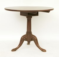 Lot 628 - A George III circular mahogany tripod table