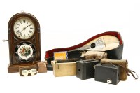 Lot 292 - An American walnut mantel clock
