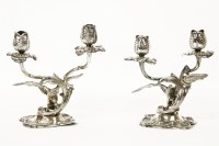 Lot 133 - A pair of 800 standard twin barrel candlesticks