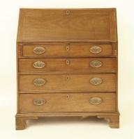 Lot 654 - A George III mahogany bureau