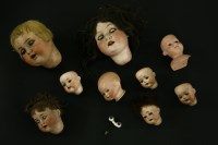 Lot 399 - Nine bisque heads