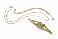Lot 14 - A gold curb link chain with sphere charm