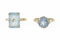 Lot 3 - A 9ct gold single scissor cut blue paste stone ring