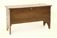 Lot 585 - An 18th century oak six plank coffer