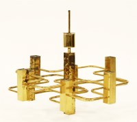 Lot 630 - A brass eight-light light fitting