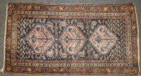 Lot 632 - A blue ground Caucasian carpet