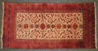 Lot 623 - A camel ground Persian rug