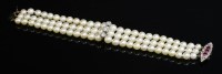 Lot 273 - A three row graduated cultured pearl bracelet