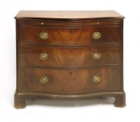 Lot 1037 - A Hepplewhite period mahogany serpentine commode