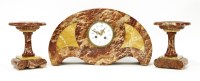 Lot 193 - An Art Deco 'bat wing' rouge marble clock garniture