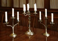 Lot 377 - A pair of slender turned and wrought brass
