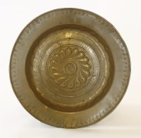 Lot 386 - A Nuremberg pressed brass alms dish