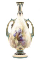 Lot 179 - A Hadley's Worcester twin handled vase