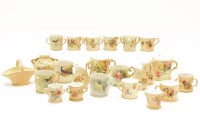 Lot 176 - Twenty three miniature Royal Worcester jugs