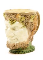 Lot 169 - A late 18th century Bacchus pottery jug