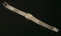 Lot 286 - A ladies' 9ct white gold Tissot mechanical bracelet watch