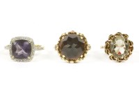 Lot 66 - A 9ct gold princess cut amethyst and diamond cluster ring
