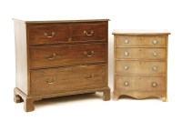 Lot 567 - An Edwardian mahogany chest of two short and two long drawers