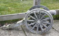 Lot 1058 - A cast aluminium canon on carriage