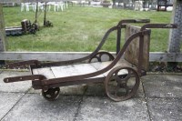 Lot 1064 - A Victorian wrought and cast iron low barrow