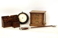 Lot 353 - A walnut miniature chest of drawers with mirrored sides