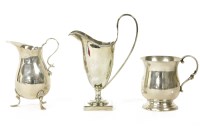 Lot 250 - A Victorian silver helmet shaped cream jug