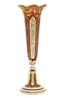 Lot 260 - A late 19th century Bohemian ruby glass and enamelled spill vase