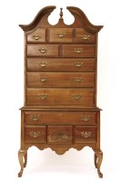 Lot 654 - An American reproduction mahogany tall boy