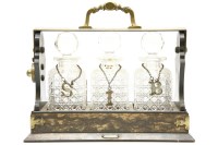Lot 302 - A Victorian grained tantalus