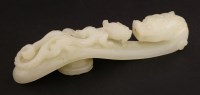 Lot 1199 - A Chinese jade belt hook