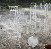 Lot 1125 - A pair of white painted metal planters