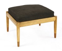 Lot 243 - A teak ottoman