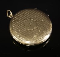 Lot 125 - An Edwardian chain hinged locket