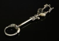 Lot 140 - A French novelty silver and gold ring style cigarette holder