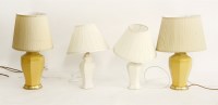 Lot 768 - A pair of yellow glazed table lamps
