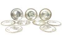 Lot 389 - A set of nine Egyptian silver side plates of circular form