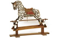 Lot 1009 - A Dapple grey rocking horse