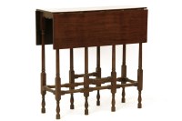 Lot 991 - A mahogany spider leg table