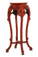 Lot 1073 - A Chinese hardwood jardinere stand