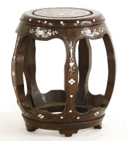 Lot 1082 - A Chinese hard wood barrel seat