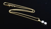 Lot 429 - A two stone diamond drop pendant with two graduated brilliant cut diamonds
