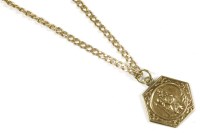 Lot 212 - A 9ct gold hexagonal St Christopher pendant